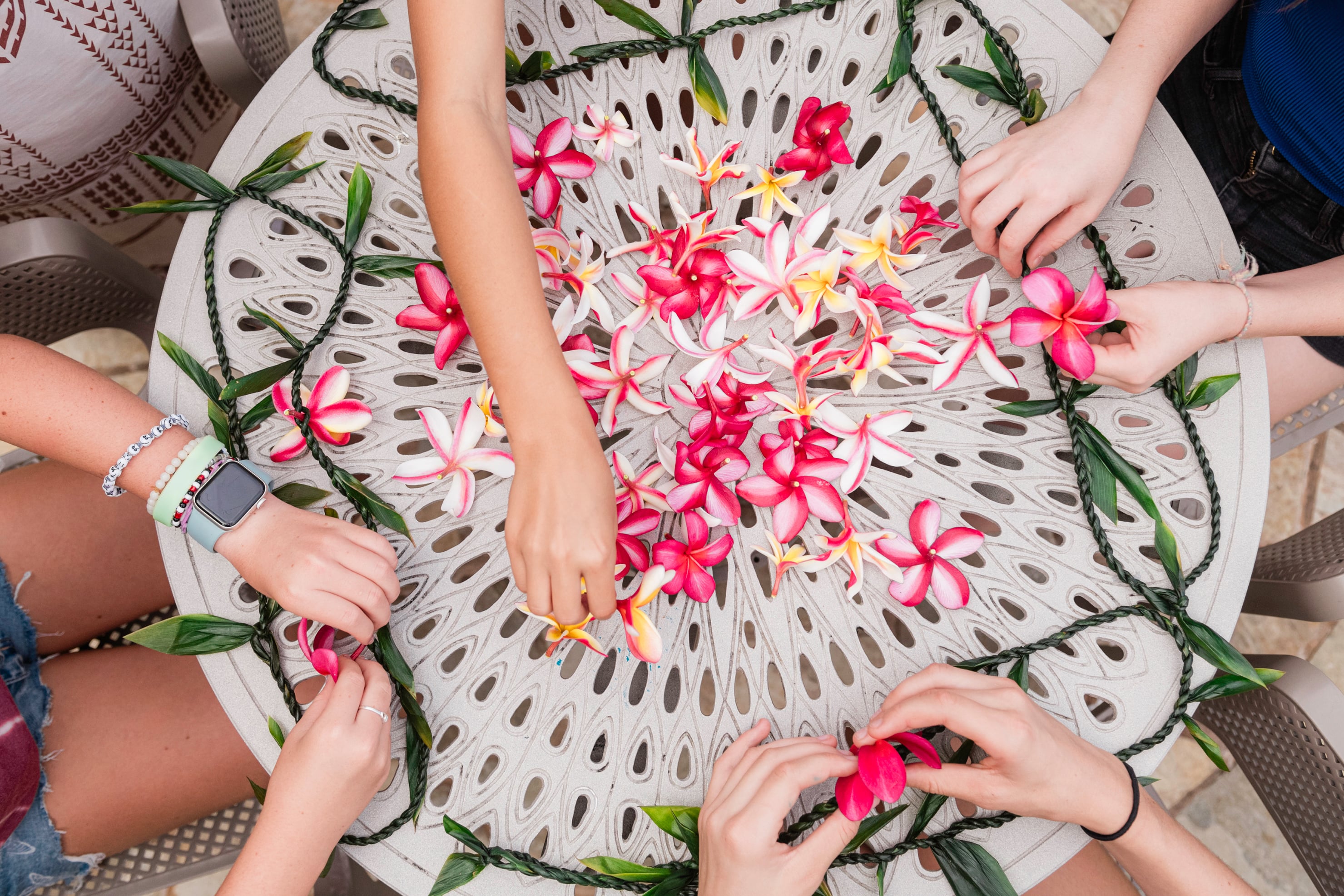 Lei making at OUTRIGGER Kauai Beach Resort & Spa