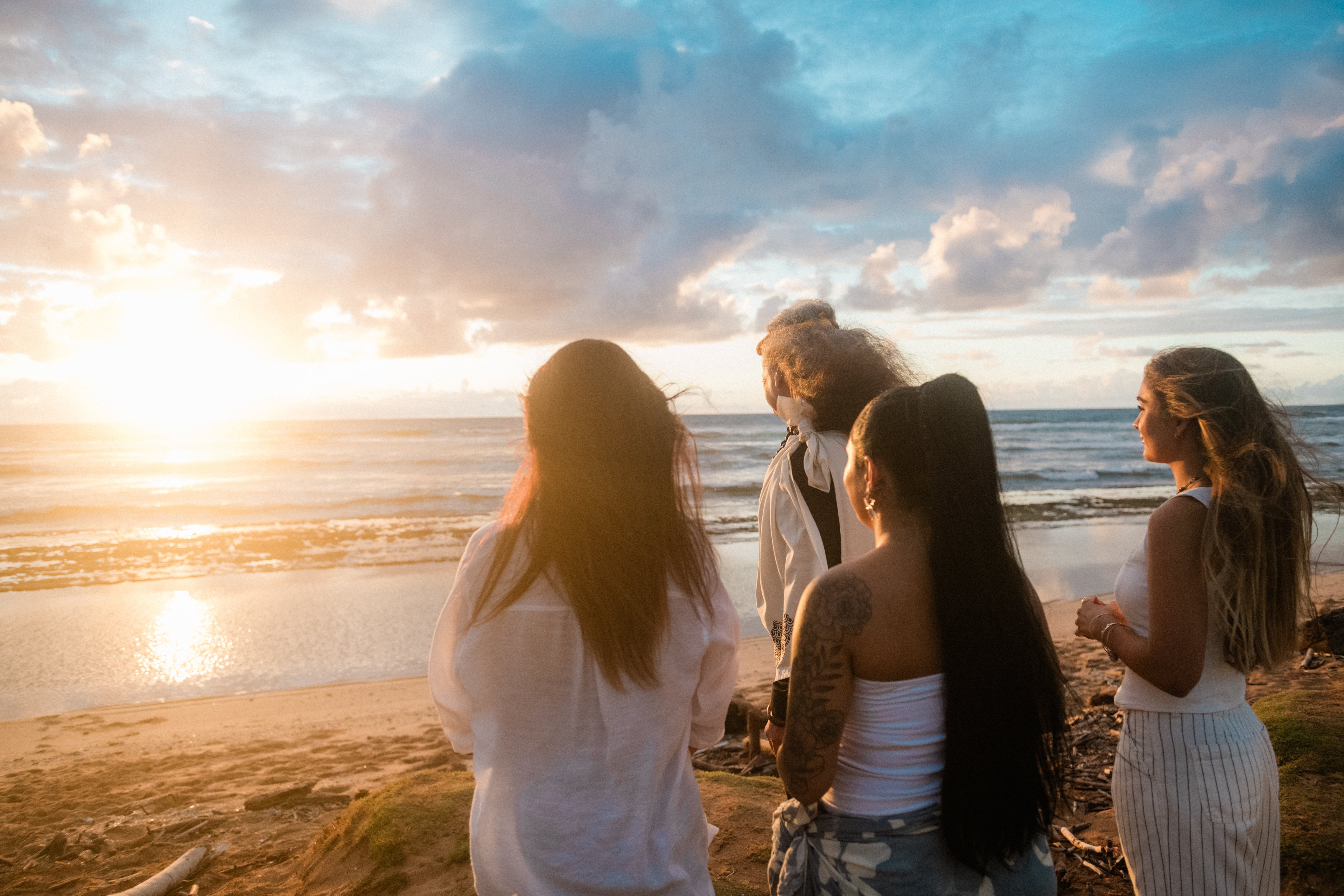 Guests watching the sun rise during E Ala E Sunrise Ceremony